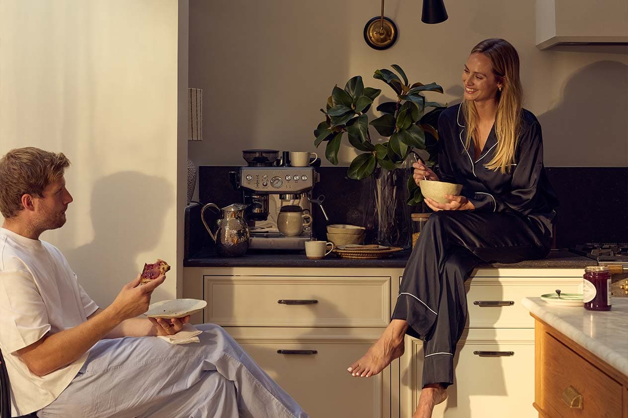 A couple enjoys breakfast together