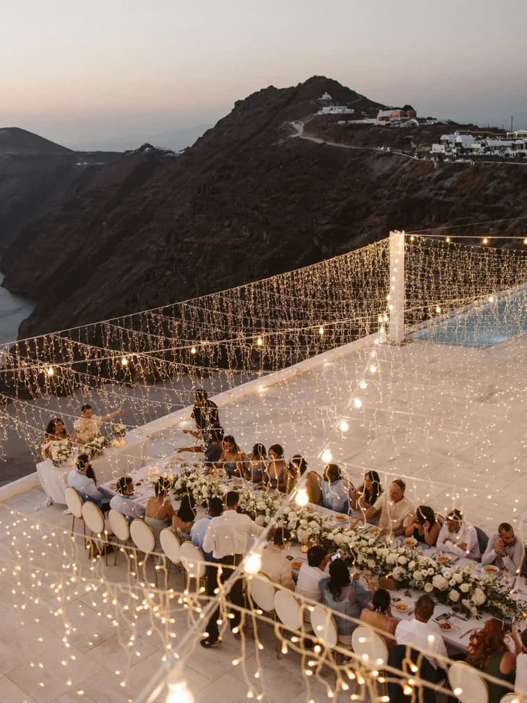 A wedding dinner on a clifftop in Greece