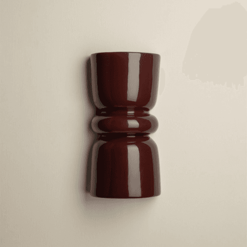 Image showing the Redonda Up & Down Ceramic Wall Light, Burgundy product.